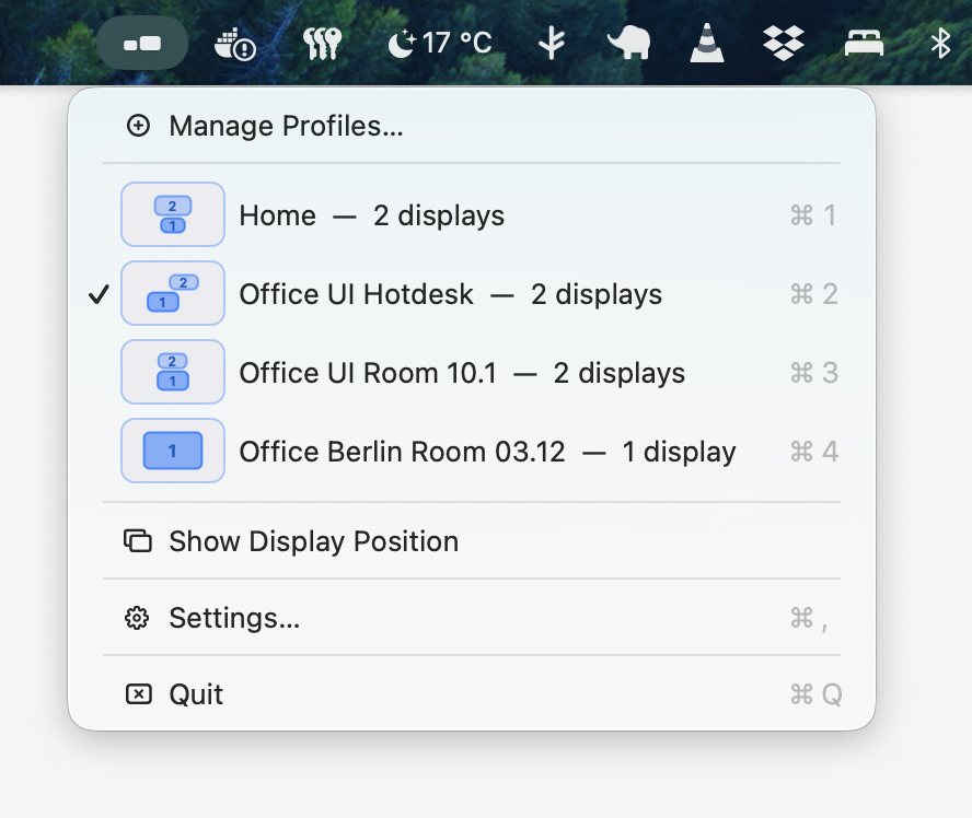 QuickDisplaySettings menu bar popup listing saved display profiles